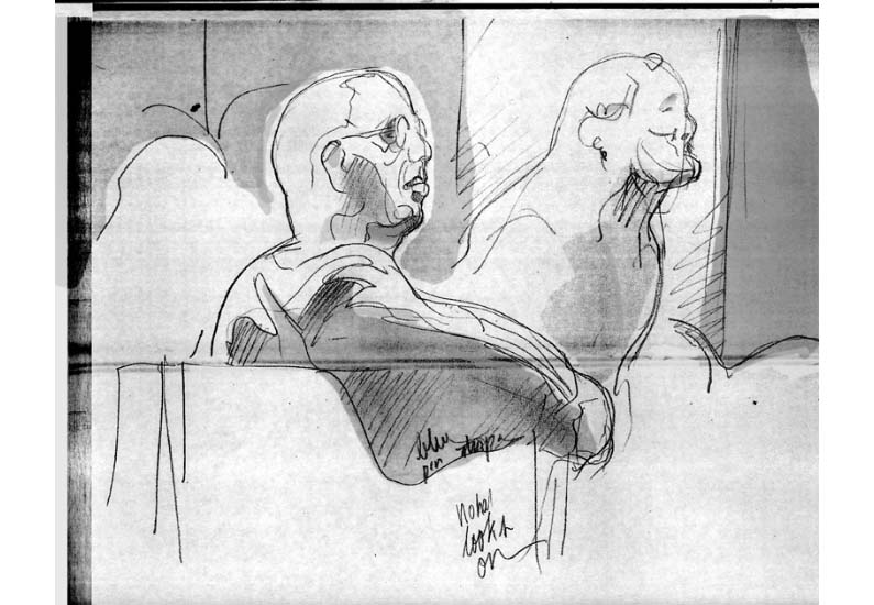 S Sias listens in court.