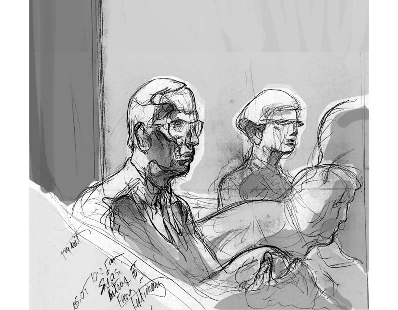 S Sias listens in court.
